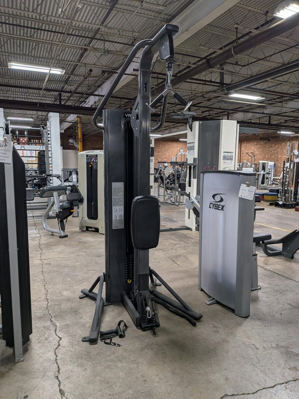 Cybex Bicep / Tricep Tower Machine – very good weight machines for sale