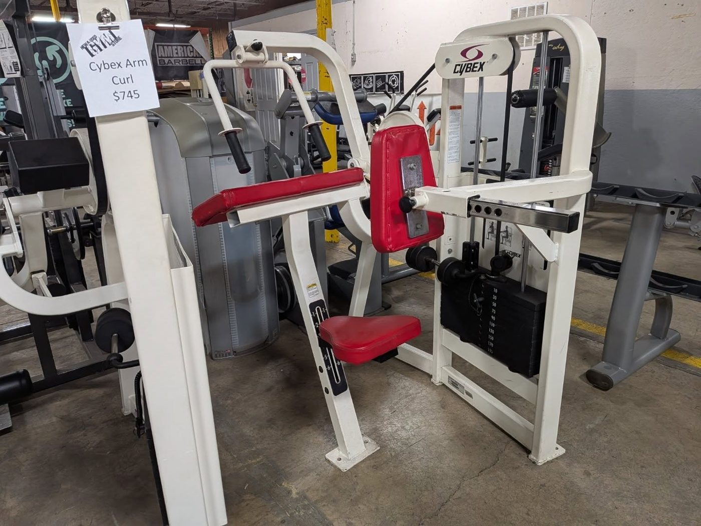 Cybex Arm Extension Machine (Red Pad) – very good weight machines for sale