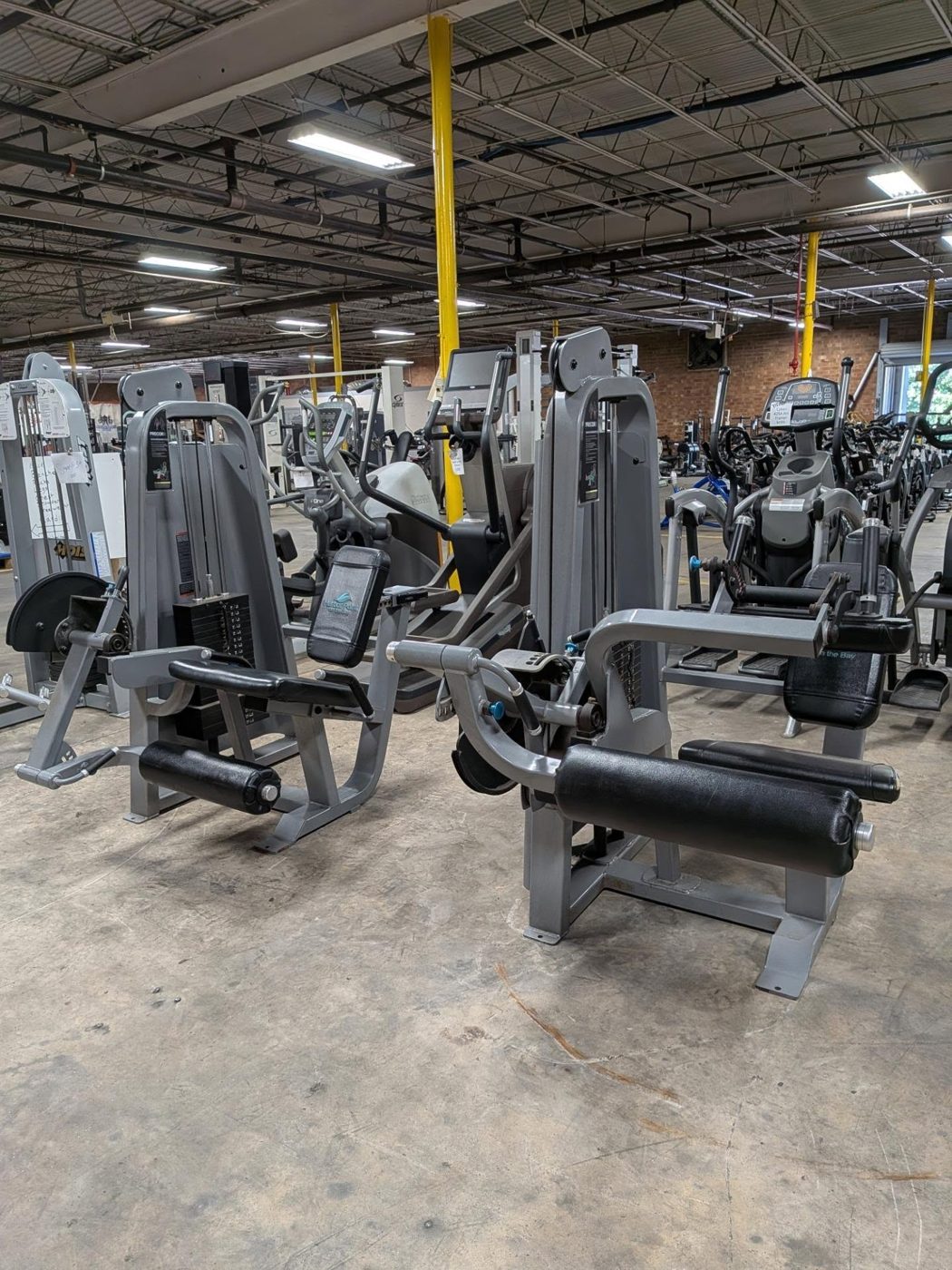 Precor Leg Extension Machine + Leg Curl Machine – very good weight machines for sale