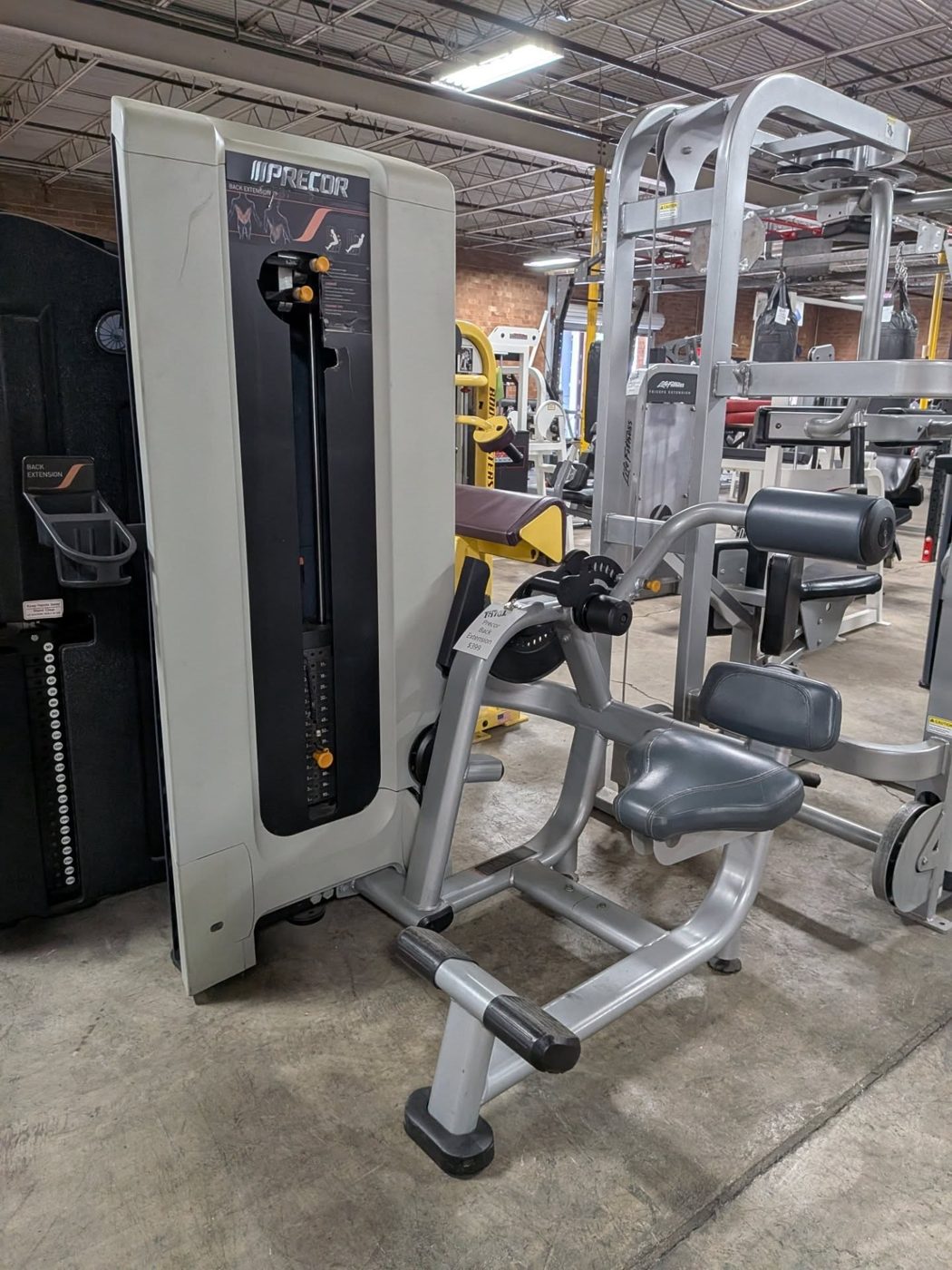 Precor Back Extension Machine – very good benches for sale
