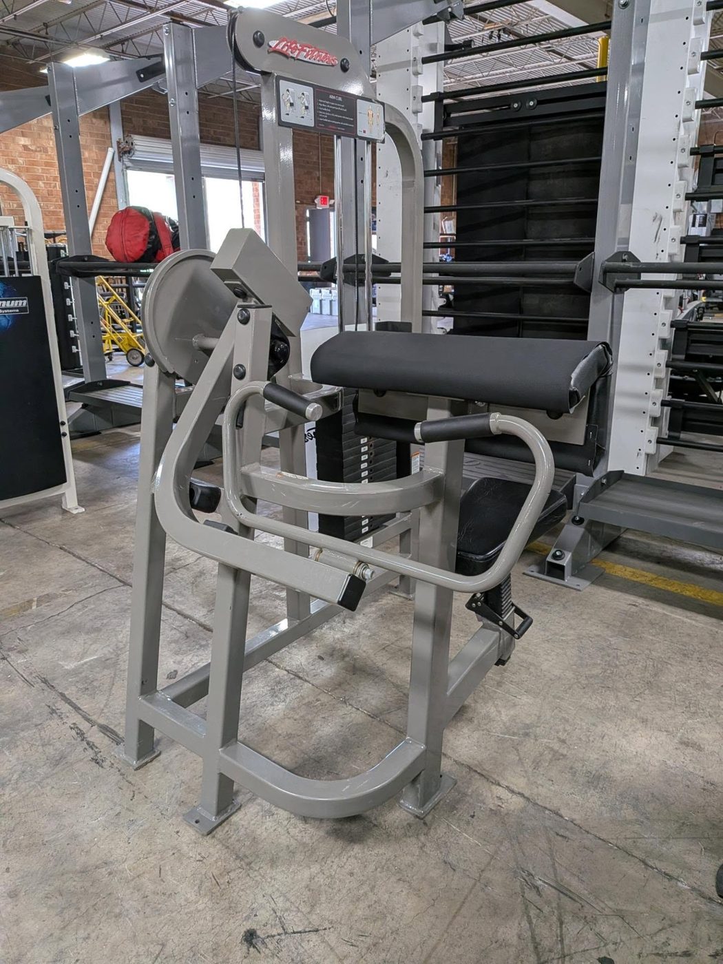 Life Fitness Arm Curl Machine – very good weight machines for sale